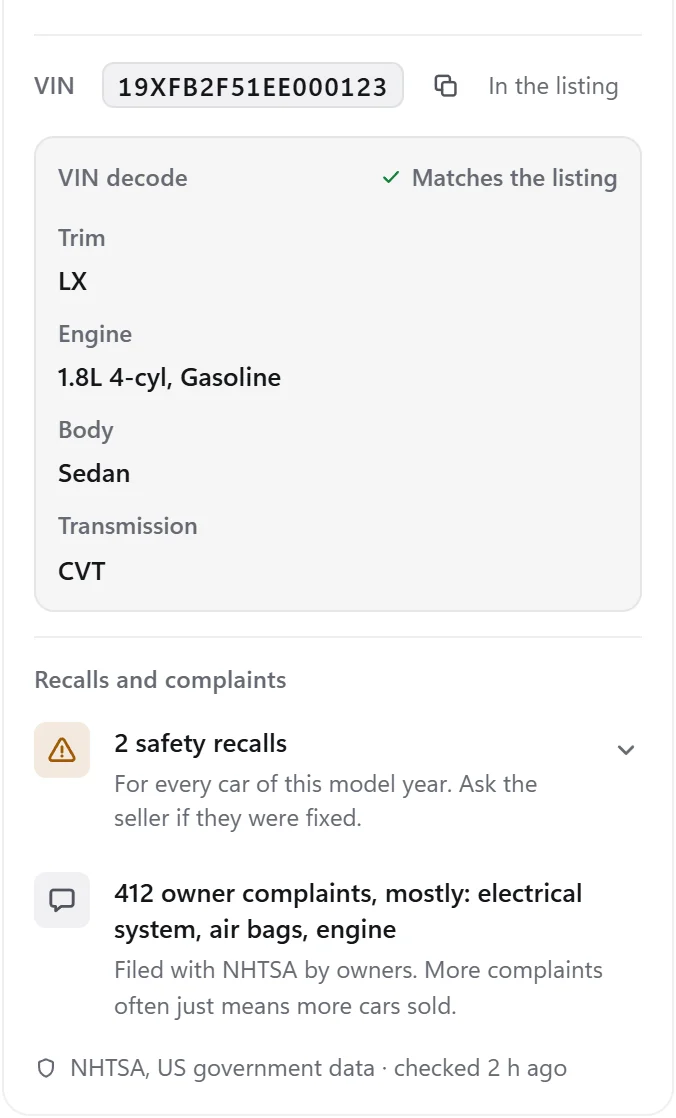 The car's VIN, decoded as an LX sedan with a 1.8 liter engine that matches the listing, plus 2 safety recalls and 412 owner complaints from NHTSA.